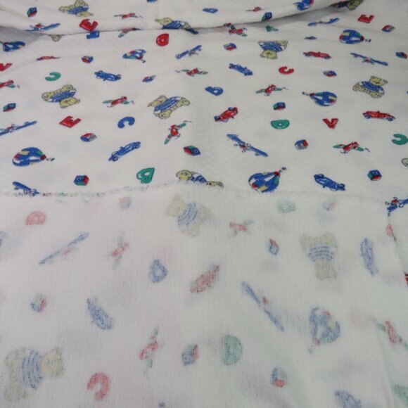 Fabric Toys Quilted Double Knit (extra warm) 60x72" (white background) yardage - Picture 4 of 4